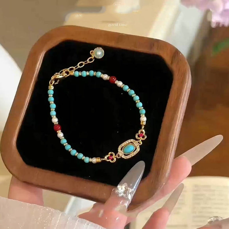 Wholesale Turquoise bead layered metal flower bracelet