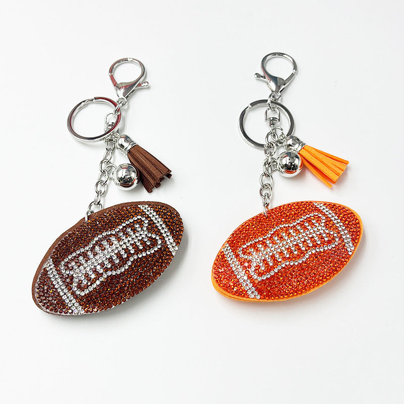 Wholesale Rhinestone rugby ball pendant with rhinestone tassels,  sporty bag accessory.
