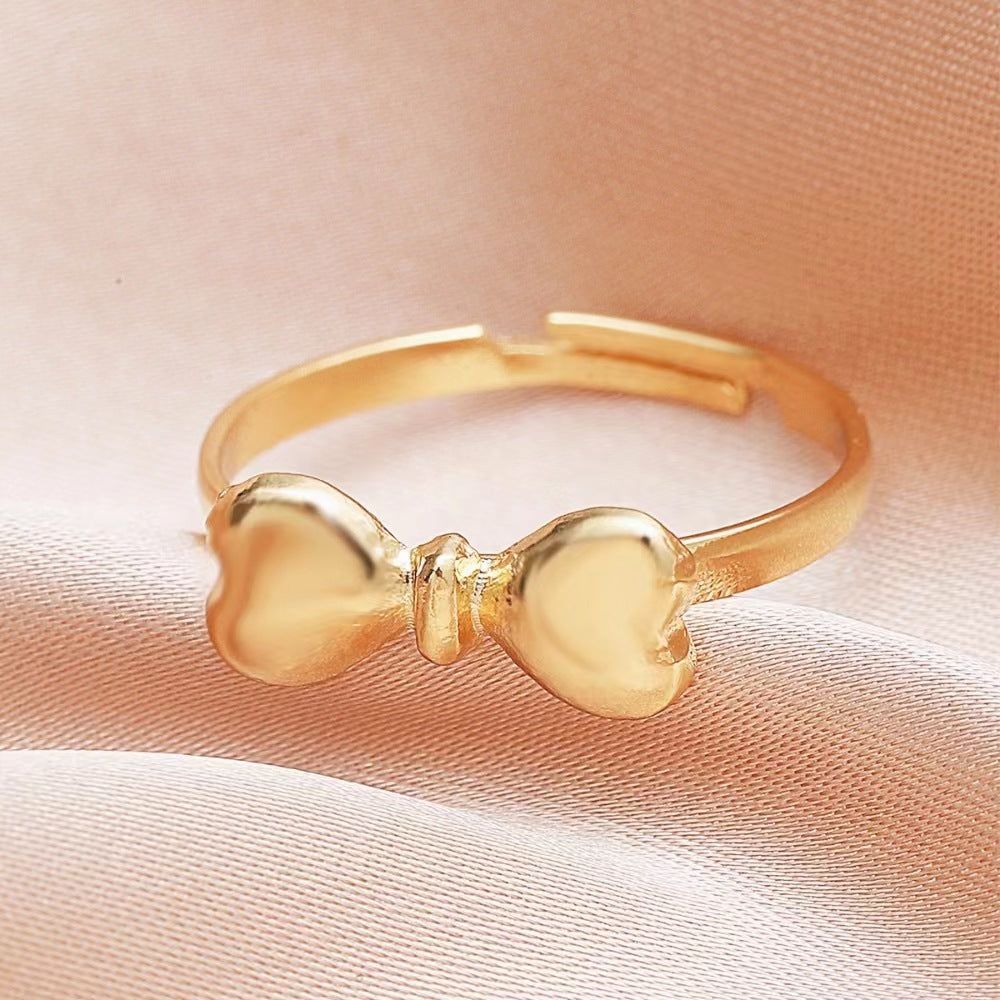 Wholesale Vintage Metal Bow Ring Micro-Inlaid Pink Zirconia Open Ring