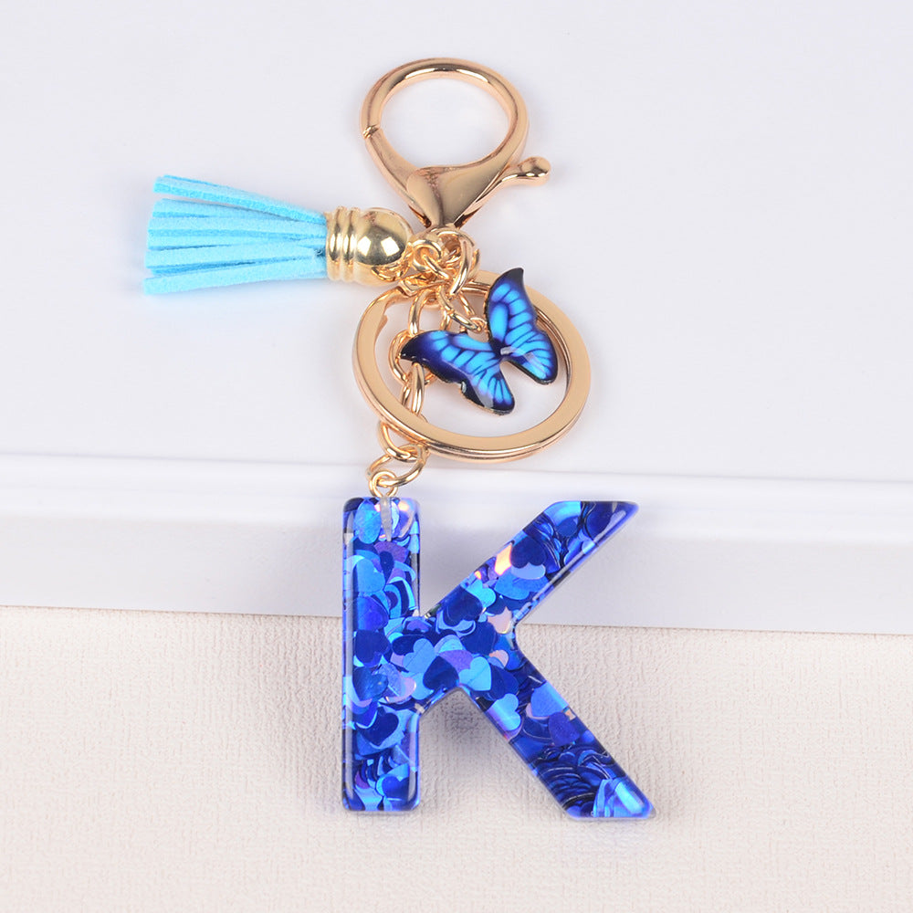 卸売ブルーラブバタフライタッセルレター樹脂キーホルダー