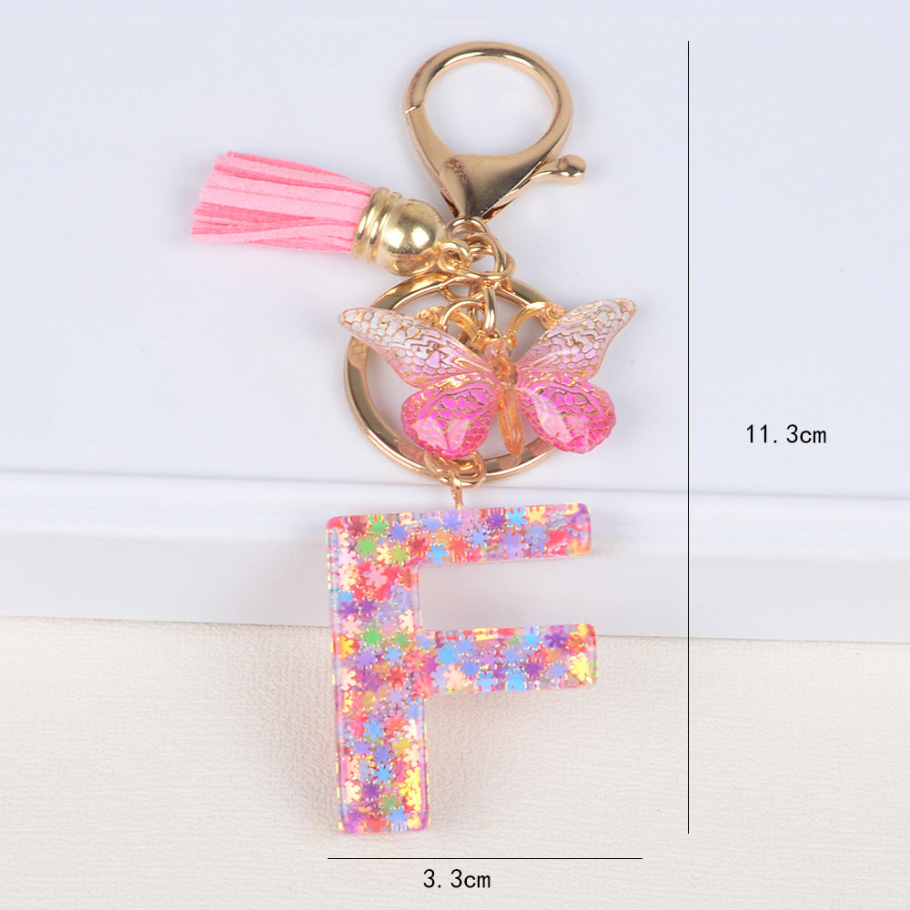 卸売スパンコールスノーフレークレター樹脂キーホルダー