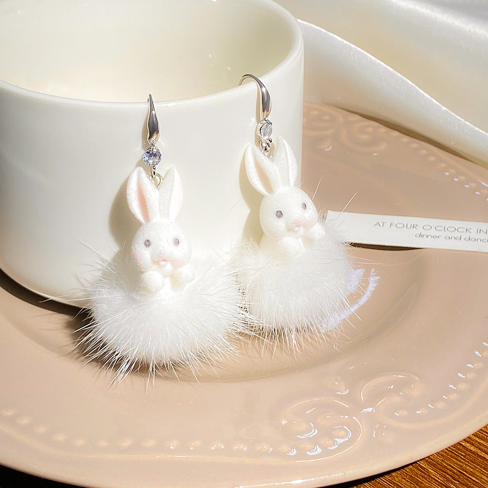 Wholesale Easter hollow asymmetrical white rabbit stainless steel earrings