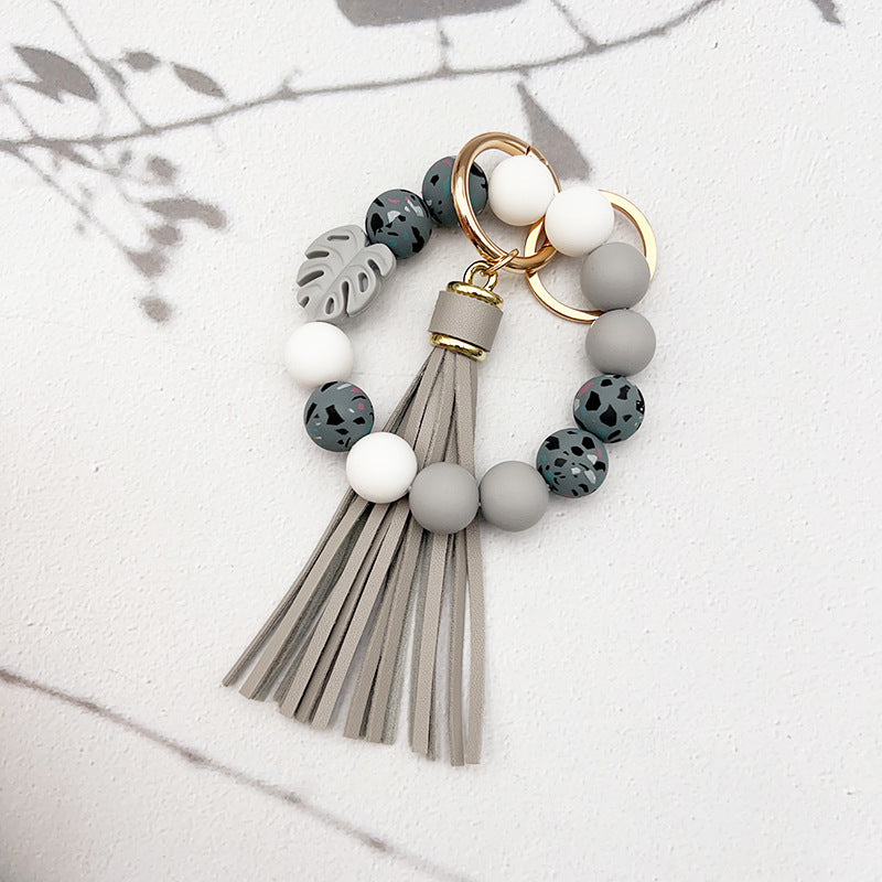 Wholesale leaf silicone printing silicone beaded tassel Wrist keychain