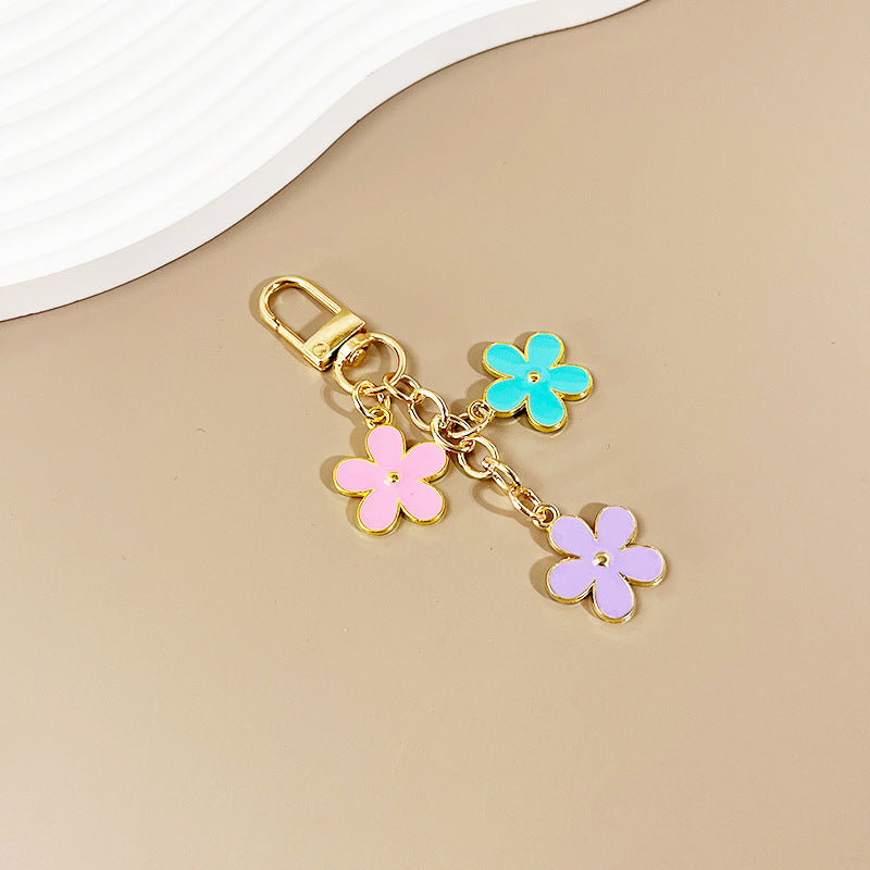 Wholesale color flower keychain creative bag pendant