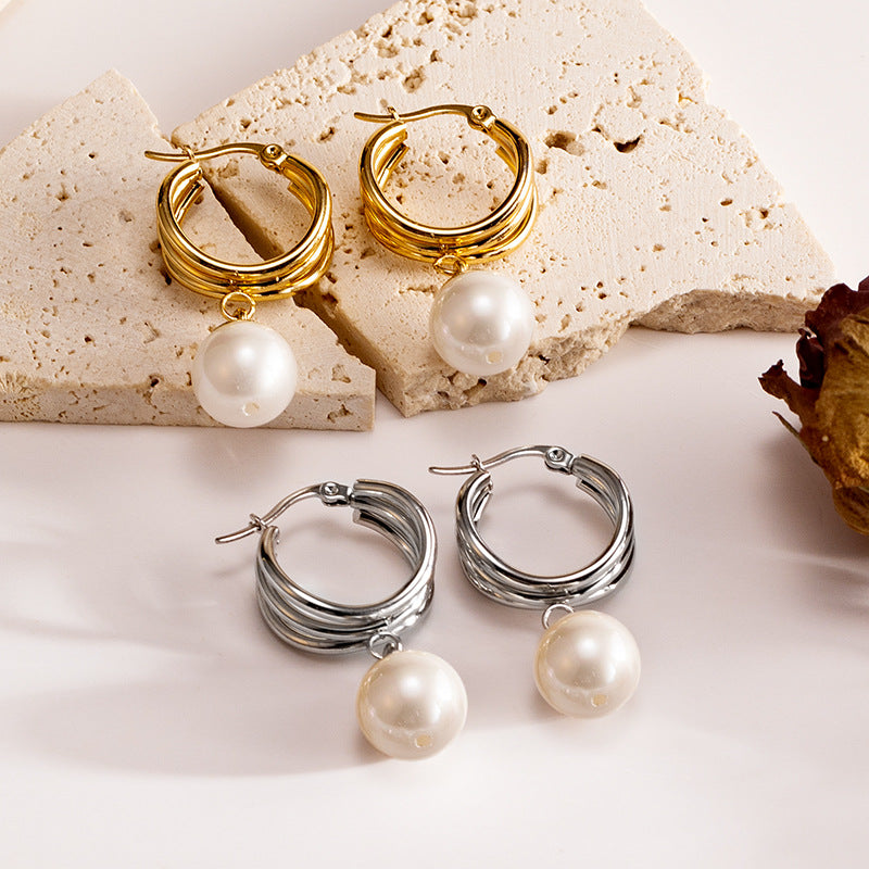Wholesale Fashionable high-end design pearl pendant earrings