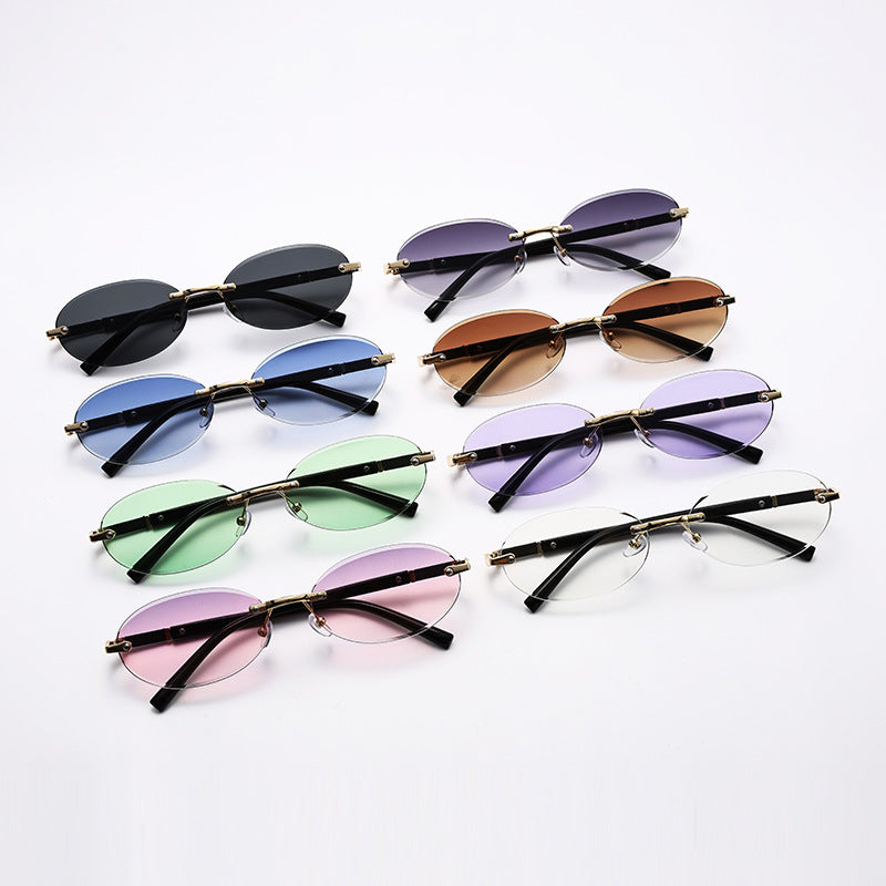 Wholesale Hot Girl Cut Edge Personalized Oval Frame Rimless Sunglasses