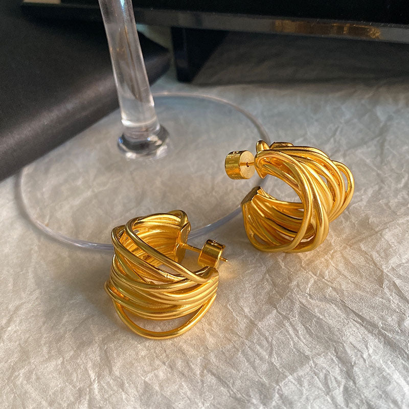 Wholesale Gold-plated hollow winding C-shaped circle retro high-end Earrings