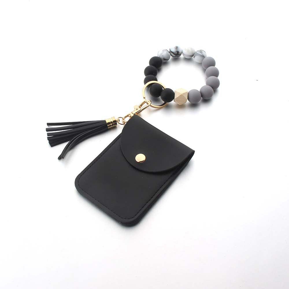 Wholesale Silicone Leather Tassel Bracelet Wooden Bead Keychain