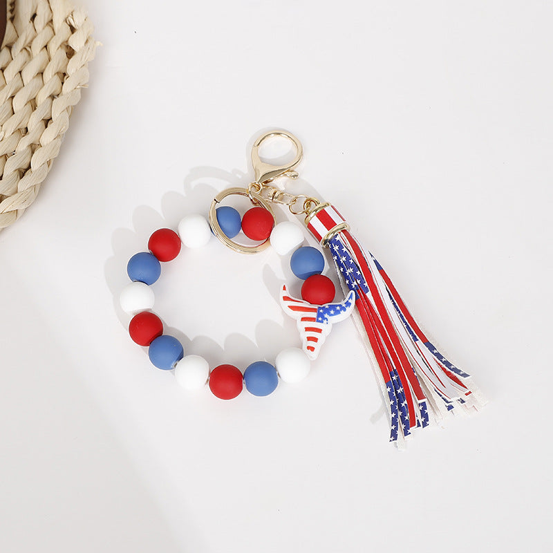 Wholesale 10pcs Halloween Cowboy Boots Silicone Tassel Wrist Keychain