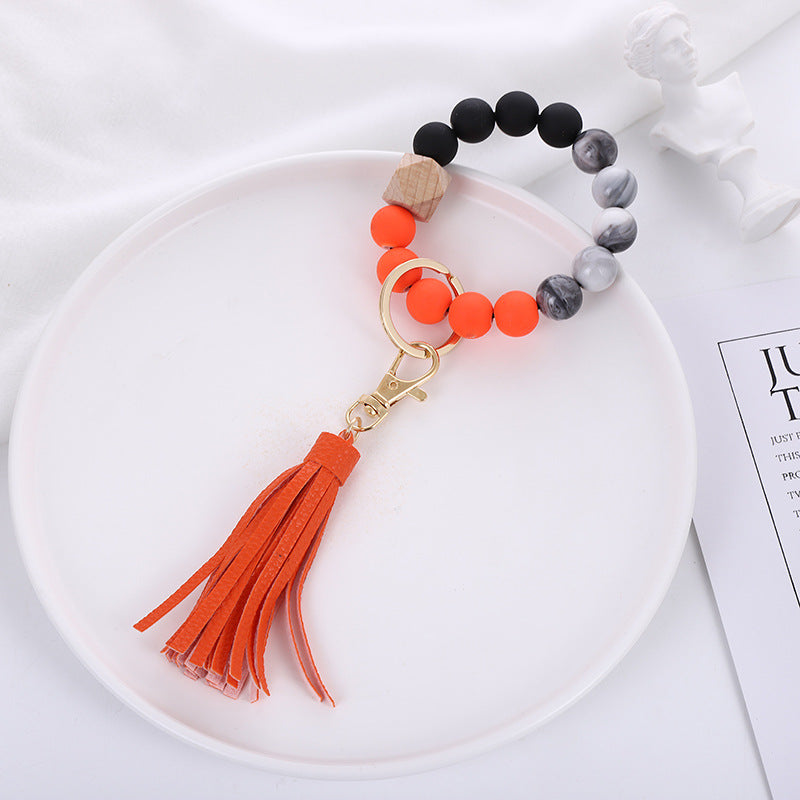 Wholesale Acrylic Beads Wooden Beads PU Tassel Bracelet Keychain