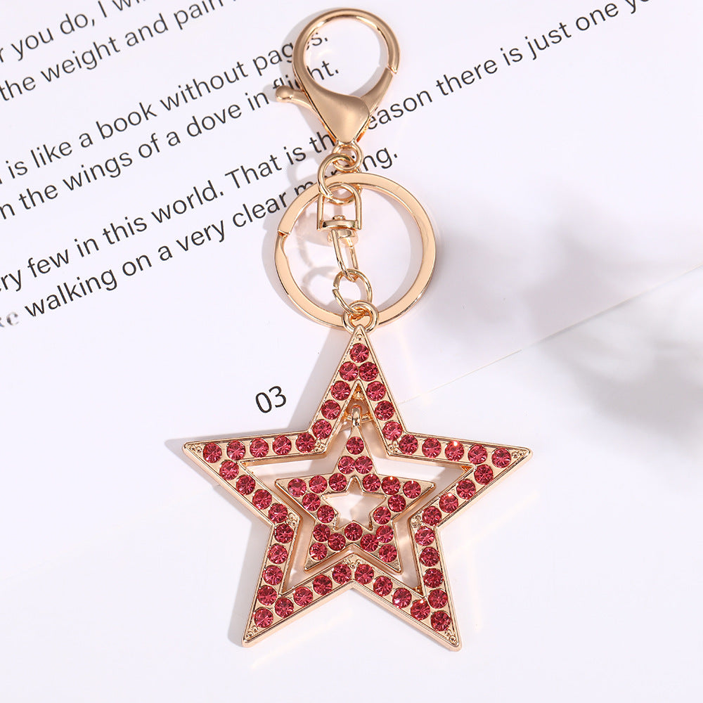 Wholesale Five pointed star hollow diamond inlaid metal keychain