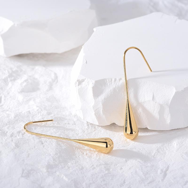 Wholesale Titanium steel stud earrings with gold-plated teardrop round beads