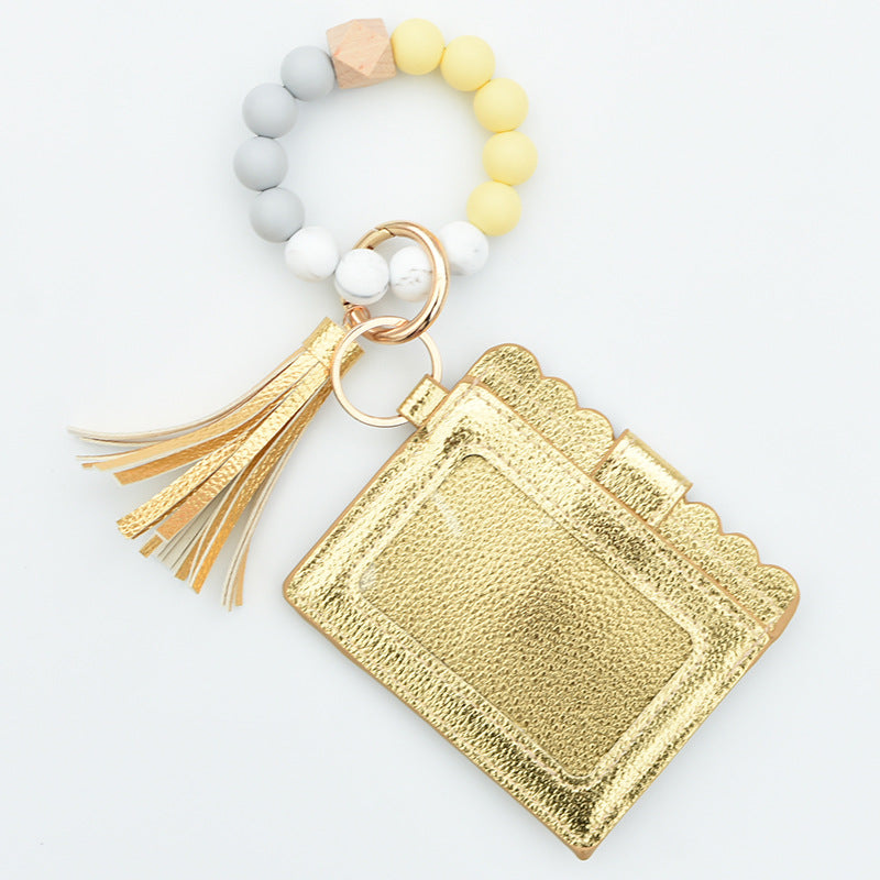 Nuevo titular de color al por mayor Silicona de muñeca con cuentas de silicona