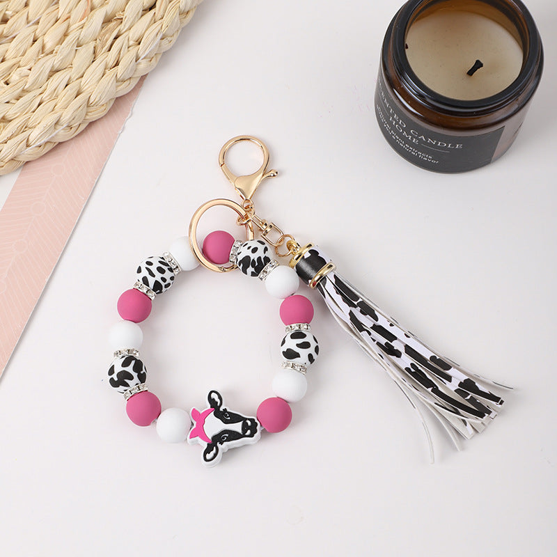 Llavero de muñeca de silicona de borla al por mayor