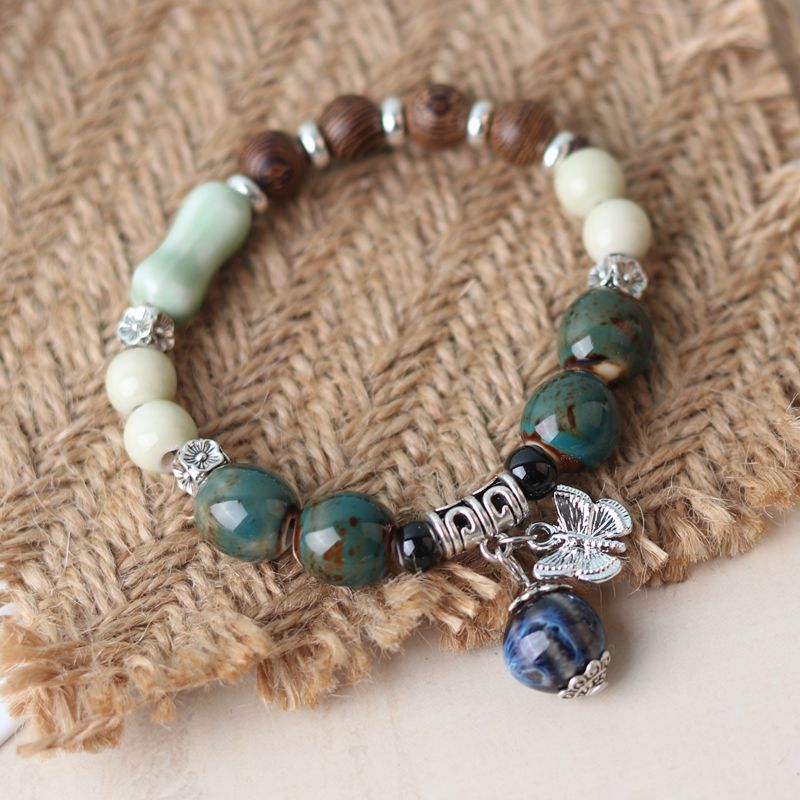 Wholesale Alloy Pendant Single Circle Ceramic Beading Bracelet