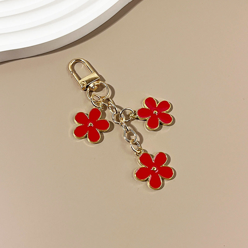 Wholesale color flower keychain creative bag pendant