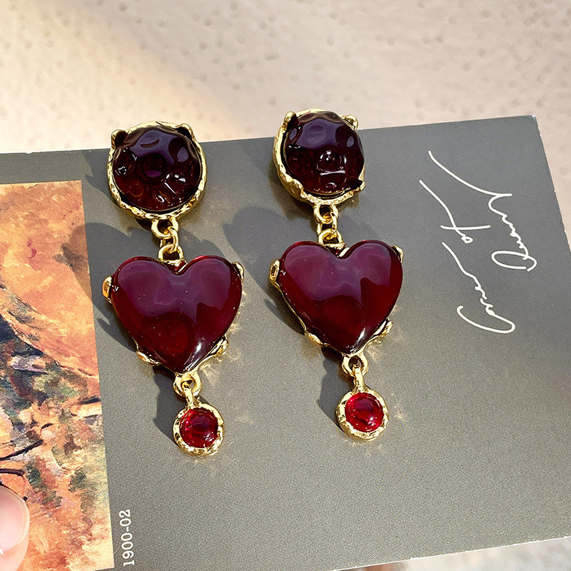 Wholesale of Glazed Red Heart Alloy Earrings