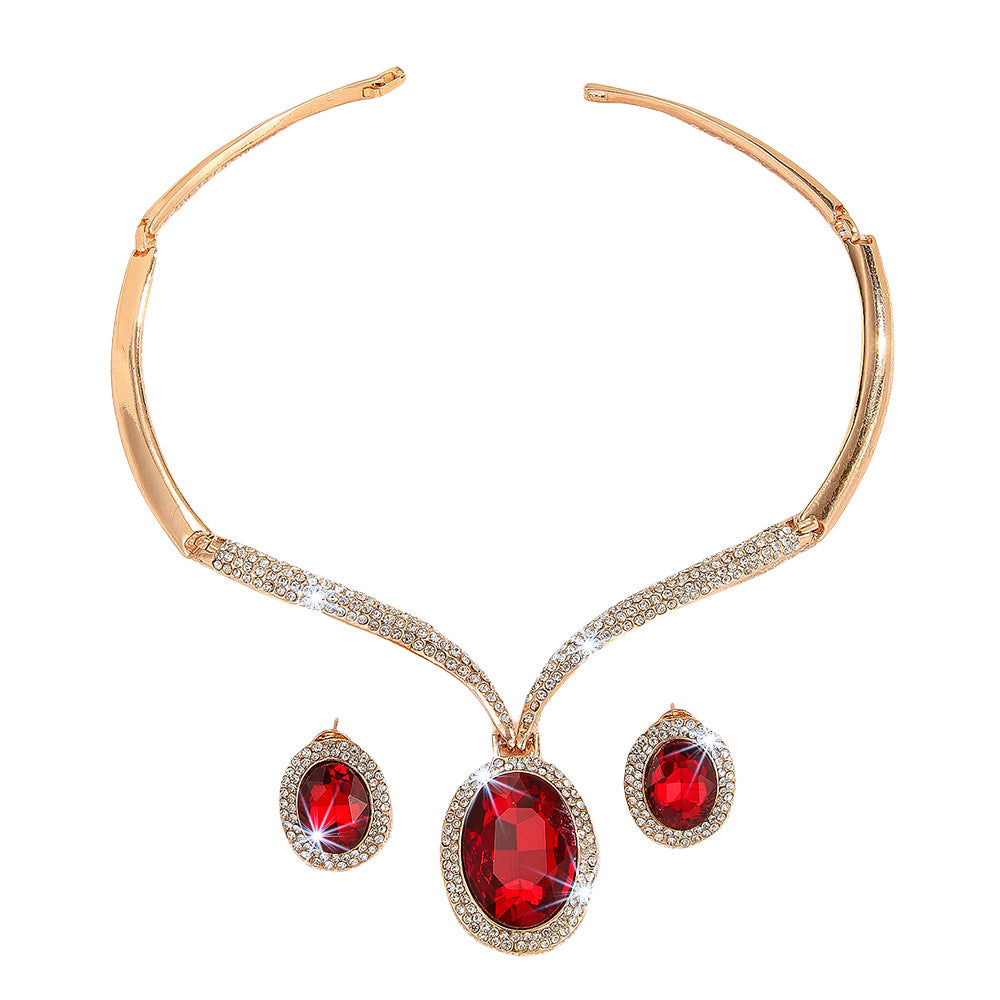 Wholesale gold zinc alloy inlaid white rhinestone red crystal necklace earrings suit women jewelry