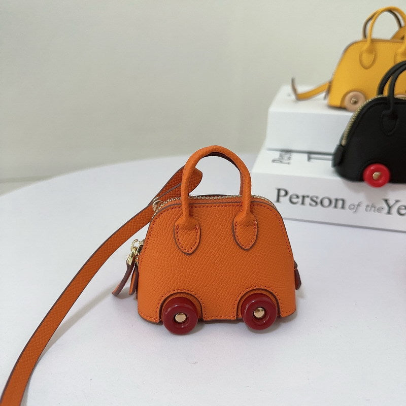 Wholesale Mini wheel shell bag cute lipstick earphone bag