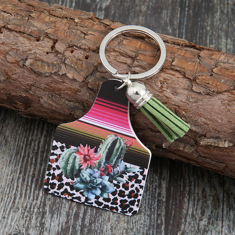 Patrón de vaca de estilo occidental al por mayor Cactus Animal Pattern Tassel Keychain