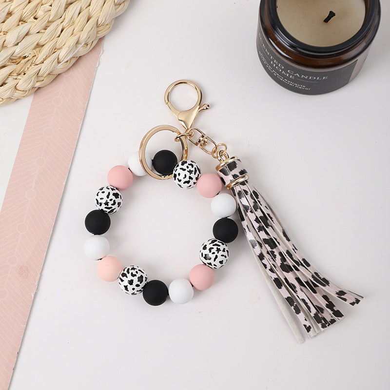 Llavero de muñeca de silicona de borla al por mayor