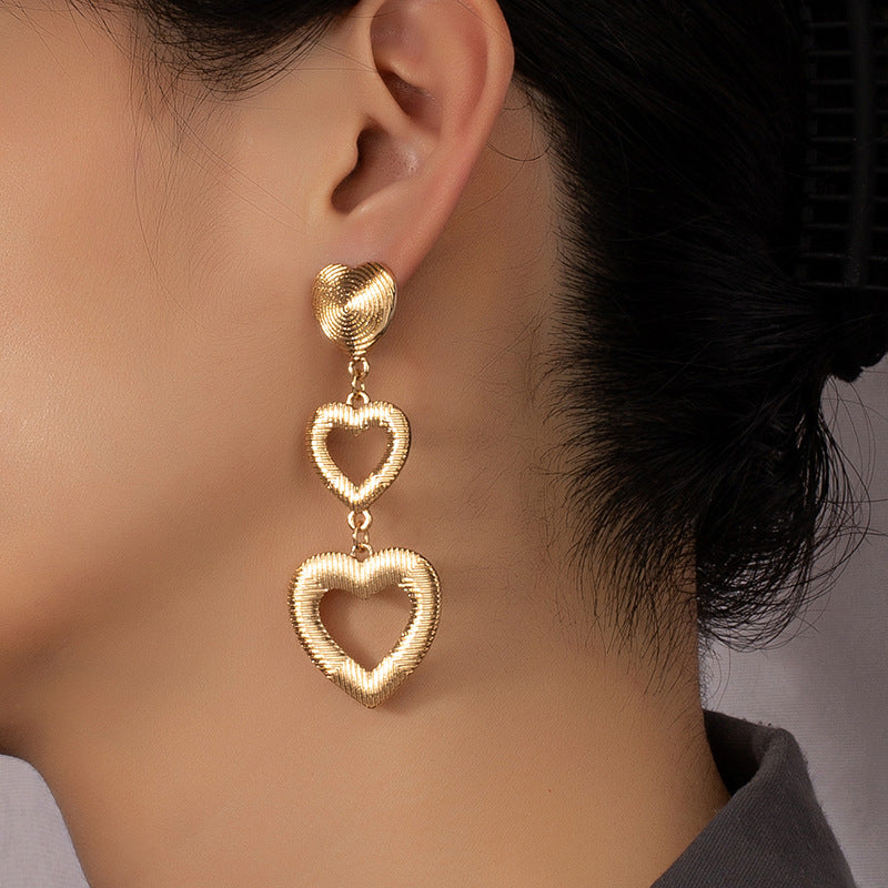Wholesale Valentine's Day Alloy Textured Heart-shaped Long Earrings
