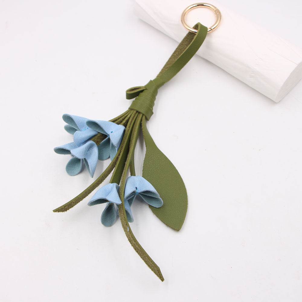 Wholesale Artificial Leather Handmade Golden Osmanthus Flower Pendant Bag Charm Stylish Decorative Car Key Accessory For Boutique Resale