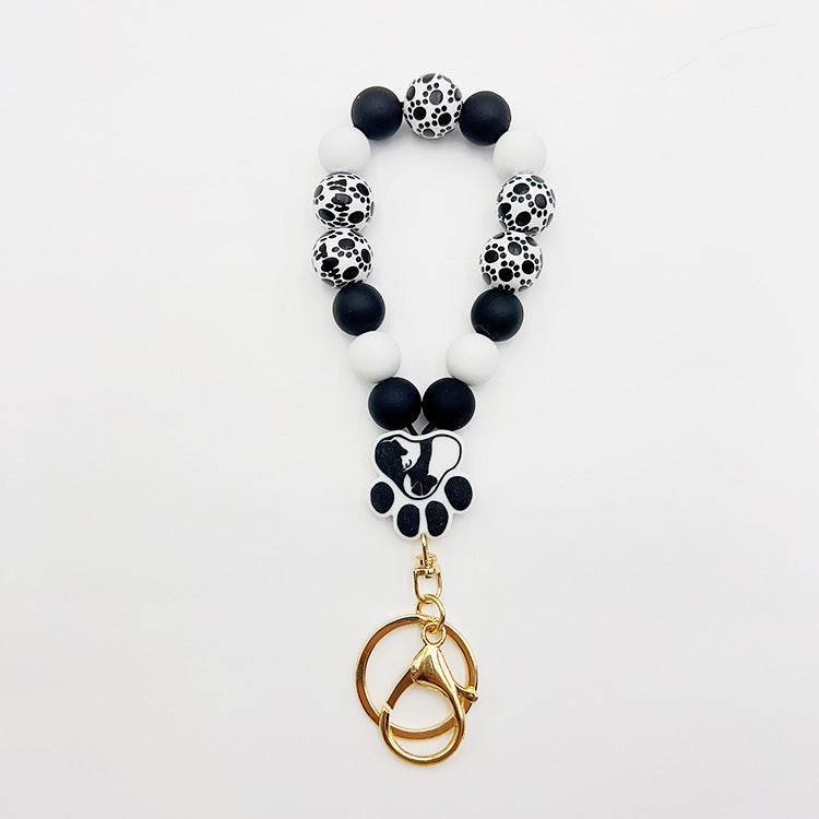 Wholesale Silicone Pumpkin Cow Ghost Dog Paw Wooden Bead Bracelet Keychain