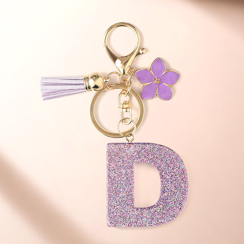 Wholesale Sparkling Pink 26 English Letter Purple Flower Keychain