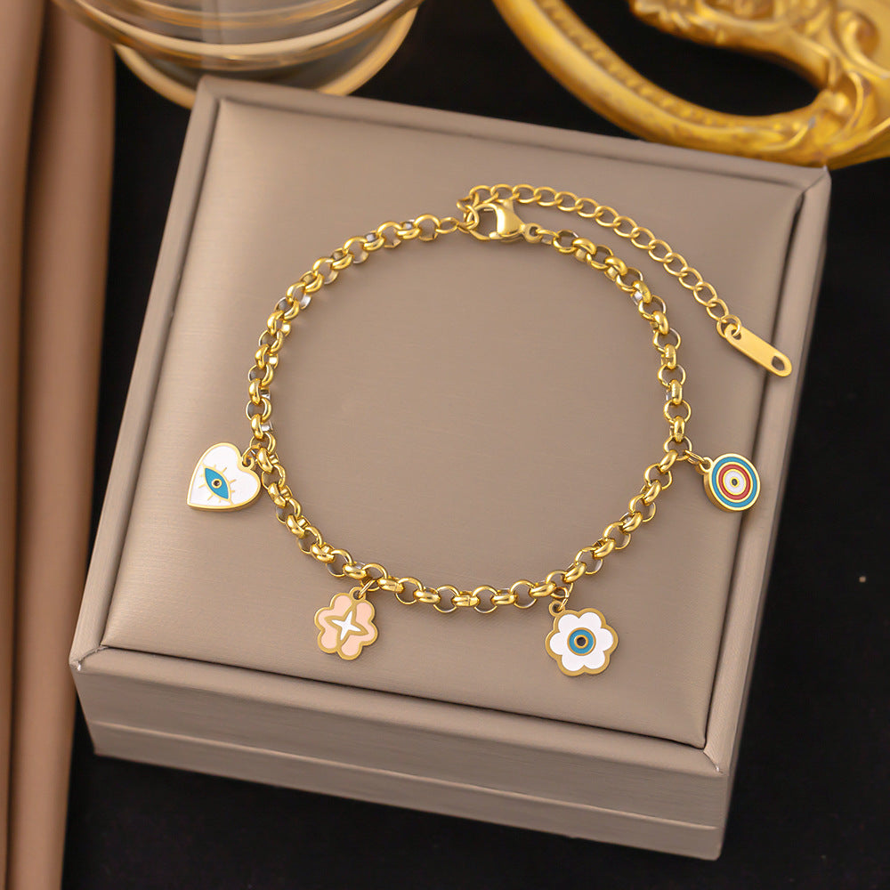 Wholesale Color Drip Oil Flower Eye Heart Titanium Steel Bracelet