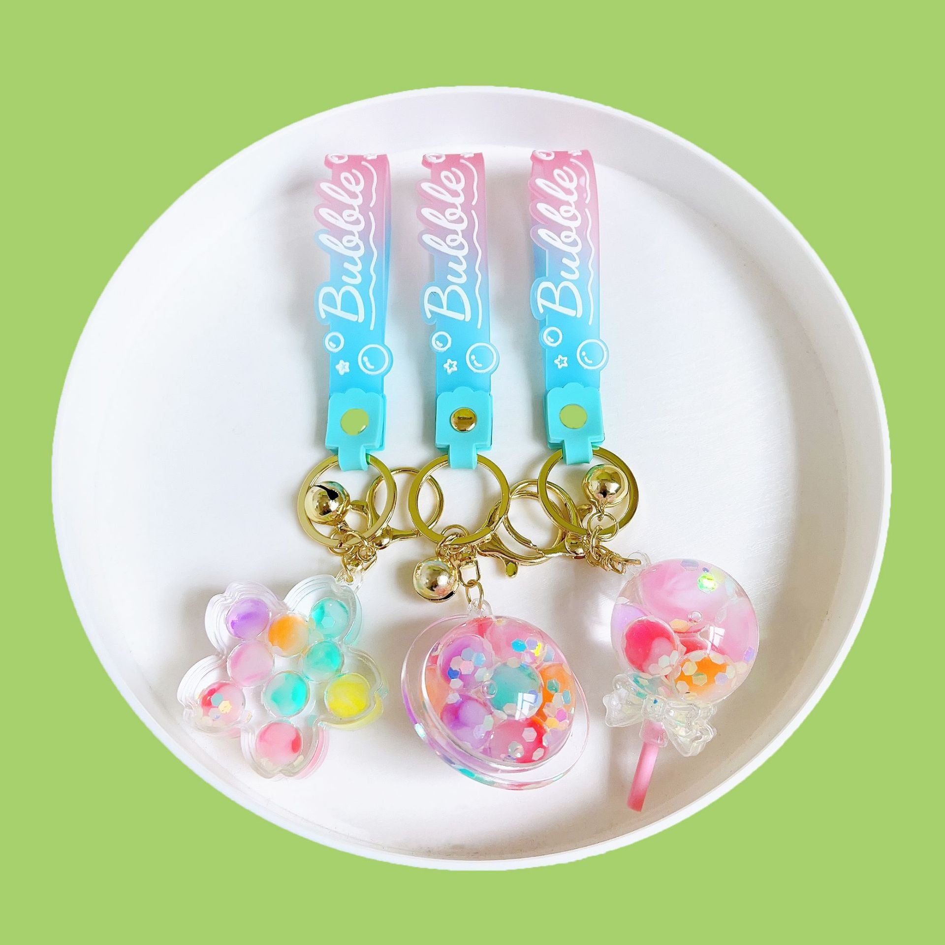 Botellas de burbujas de burbujas de luz nocturna al por mayor llavero acrílico