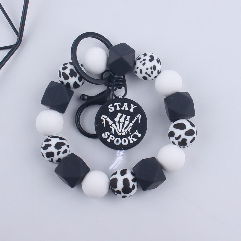 Wholesale Cartoon Bull Head Aztec Cross Silicone Beaded Wrist Keychain