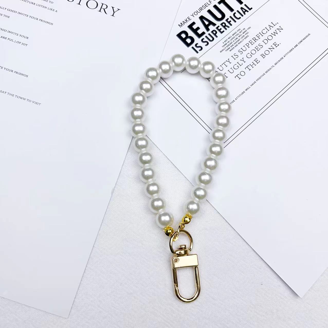 Wholesale Beauty Head Pearl Keychains