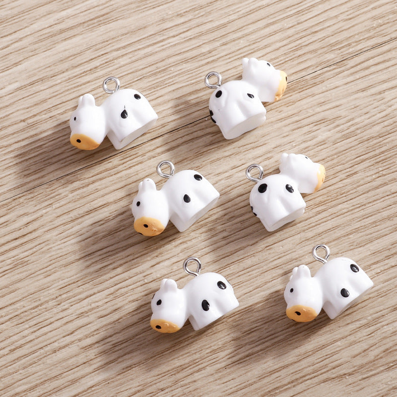 Wholesale 10 PCS/PACK of Cartoon Cow Resin Accessories DIY Keychain Jewelry Pendant
