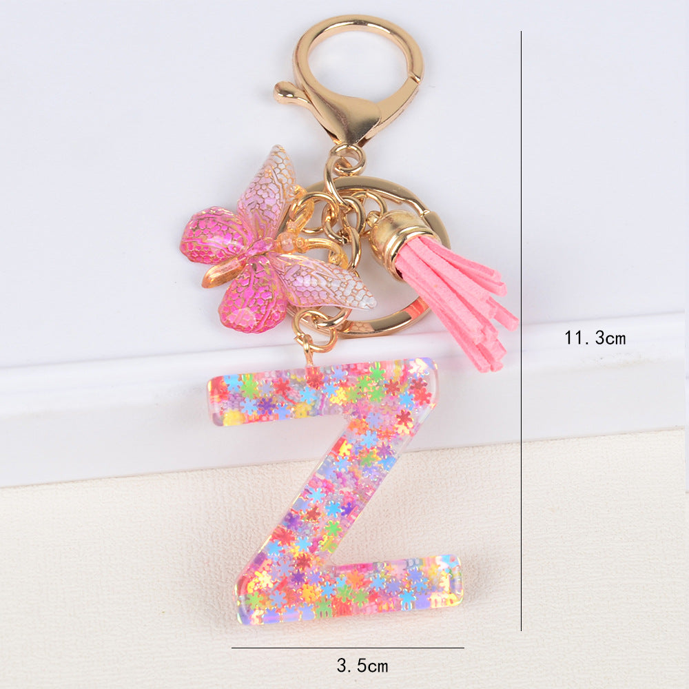卸売スパンコールスノーフレークレター樹脂キーホルダー