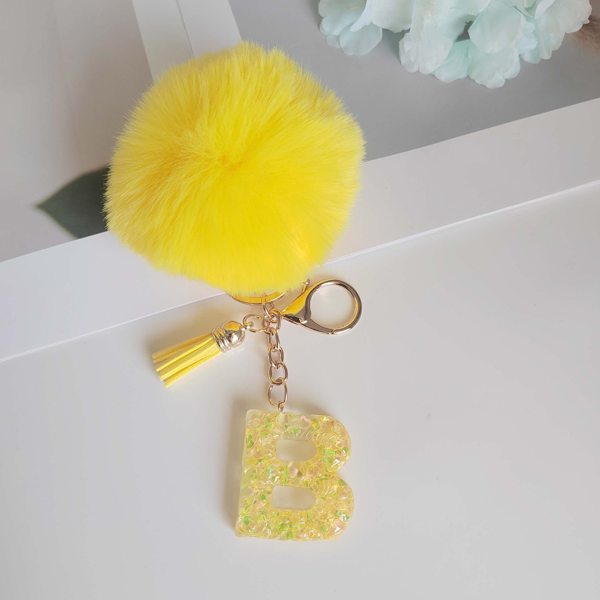 Wholesale Yellow letter ball pendant flower shaped letter keychain