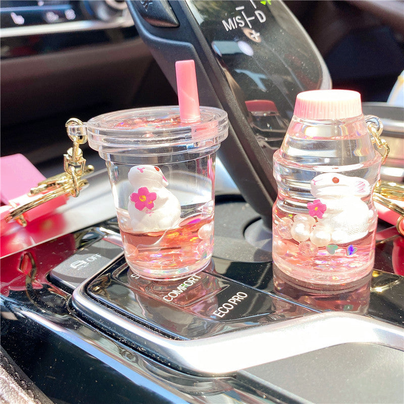 Wholesale Cherry Blossom Bunny Into Oil Milk Tea Cup Floating Bottle Acrylic Keychain