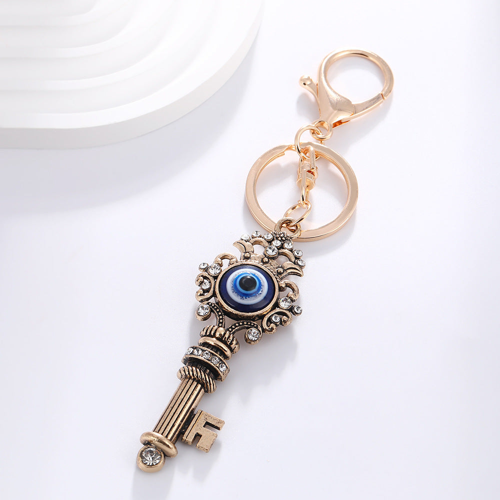 Wholesale Devil' s Eye Key Shape with Water Diamond Metal Keychain