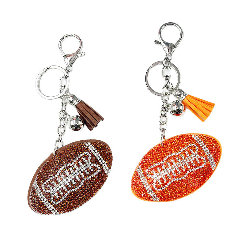 Wholesale Rhinestone rugby ball pendant with rhinestone tassels,  sporty bag accessory.