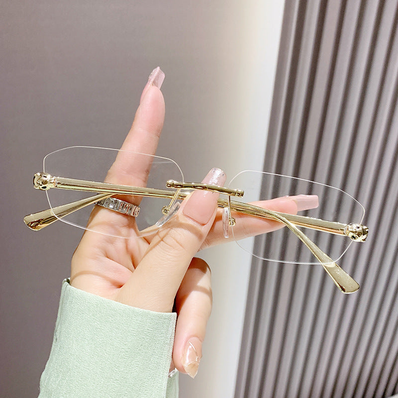 Wholesale Metal trimmed frameless polygonal cheetah decorative sunglasses