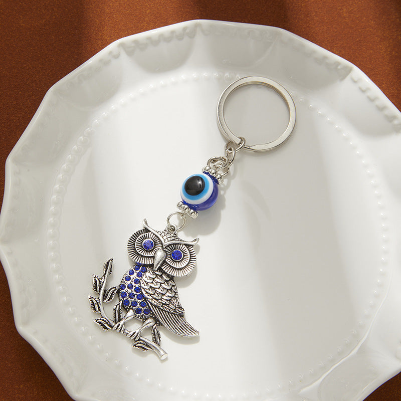 Wholesale Devil' s Hand Blue Eyes Tree of Life Metal Keychain