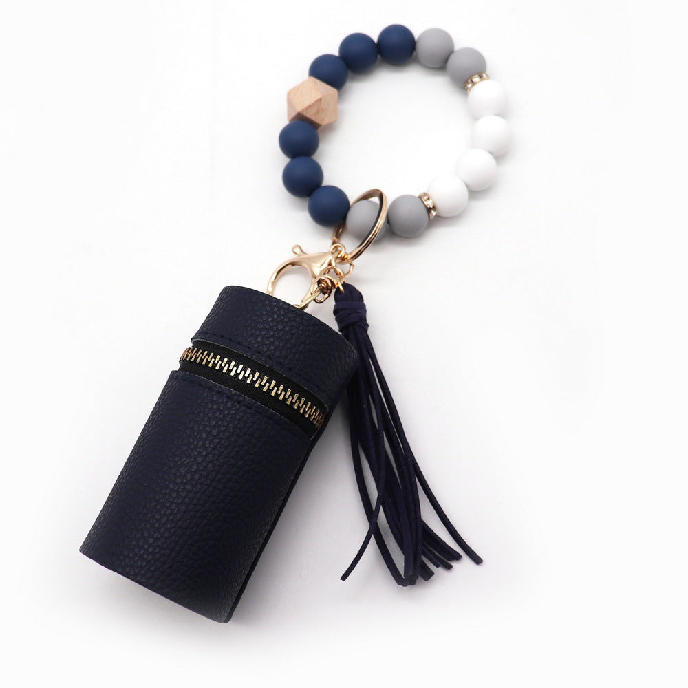 Wholesale Silicone Coin Purse Small Bag Mini Lipstick Earphone Keychain