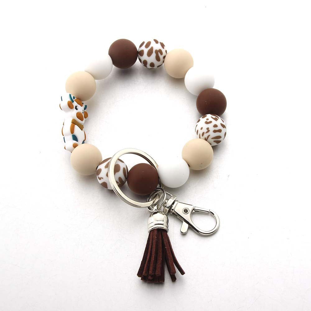 Wholesale Silicone Cartoon Animal Highland Milk Cow Tassel Wrist Keychain