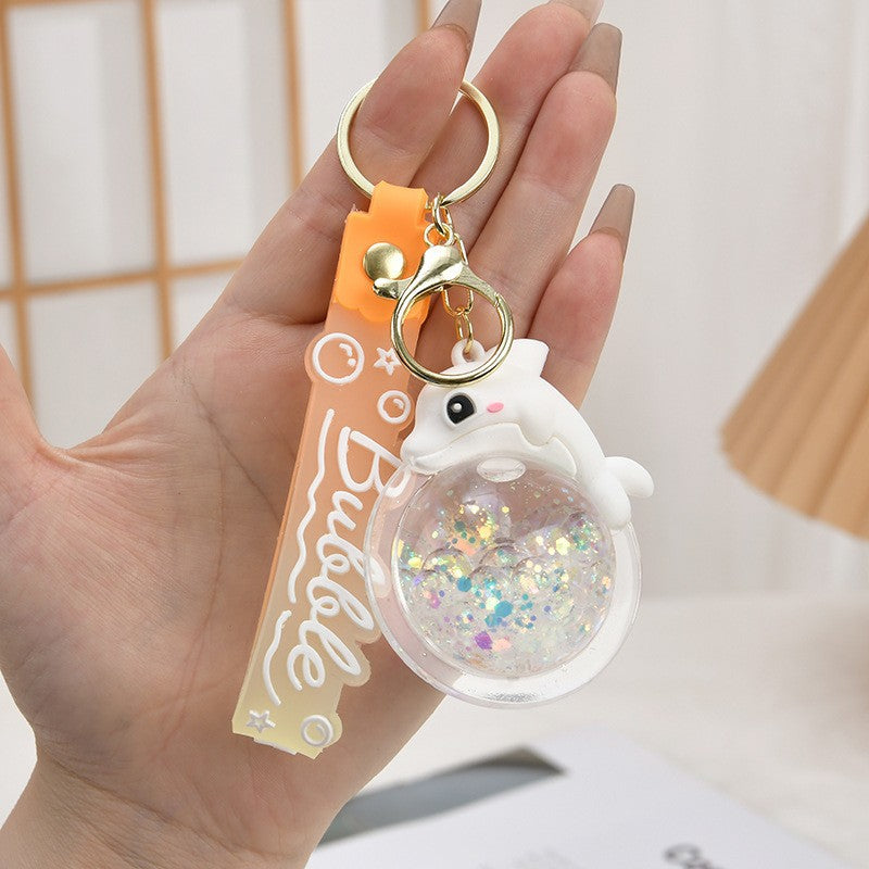 Wholesale Acrylic flowing sand bottle bag keychain