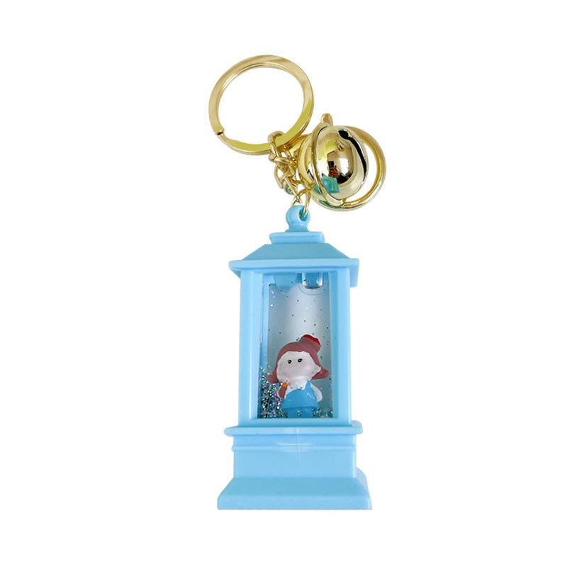Llavero de faro acrílico al por mayor con luces y aceite para niñas