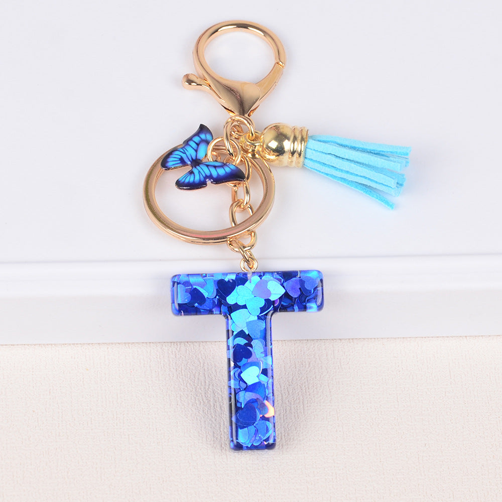 卸売ブルーラブバタフライタッセルレター樹脂キーホルダー