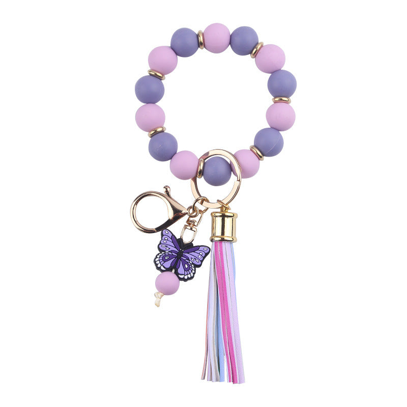 Wholesale PU Tassel Beaded Cartoon Butterfly Pendant Rainbow Leather Keychain
