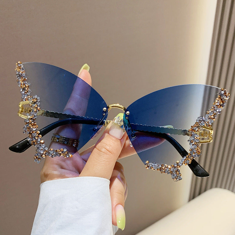 Wholesale Butterfly Shaped Diamond Inlaid Frameless PC Sunglasses