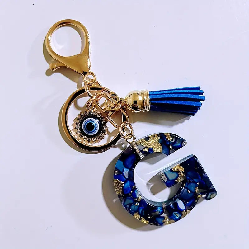 Wholesale Blue English letter Evil Eye tassel keychain