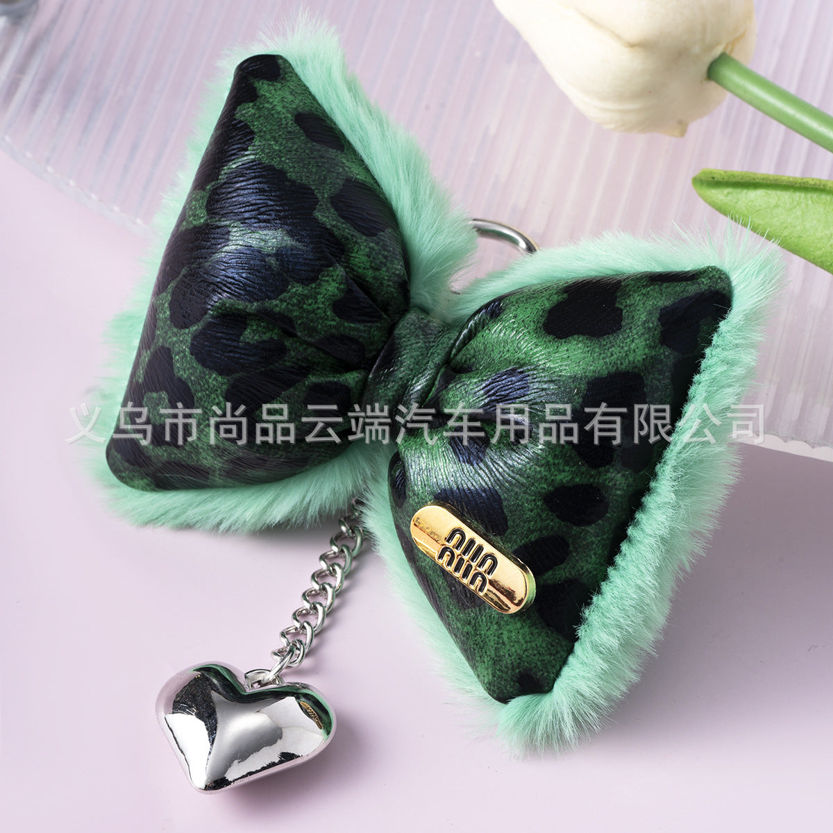 Wholesale ins light luxury leopard leather cotton-filled bow heart keychain niche design hot girl sweet cool mobile phone chain